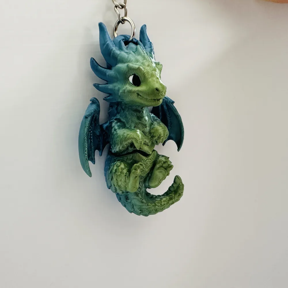 Flexi Baby Dragon Keychain - Free 3D Print Model - MakerWorld