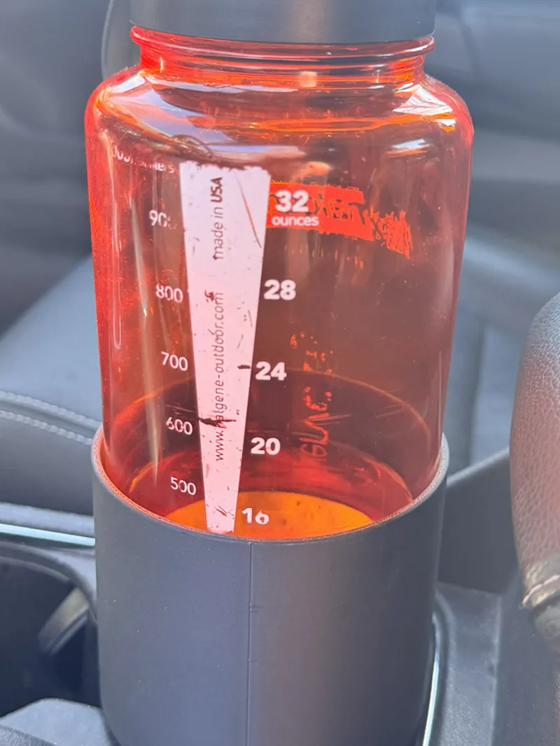 Car cupholder adapter for one liter Nalgene bottle