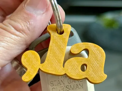 Comma-La (Kamala) Keychain