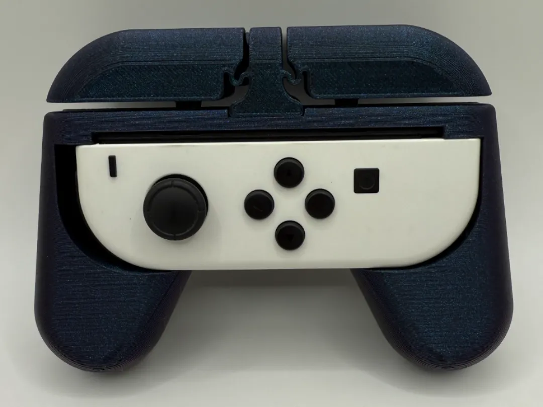JoyCon Controller Grip v3.1 by Clint’s Prints 3D MakerWorld: Download Free 3D Models - 3D model önizlemesi