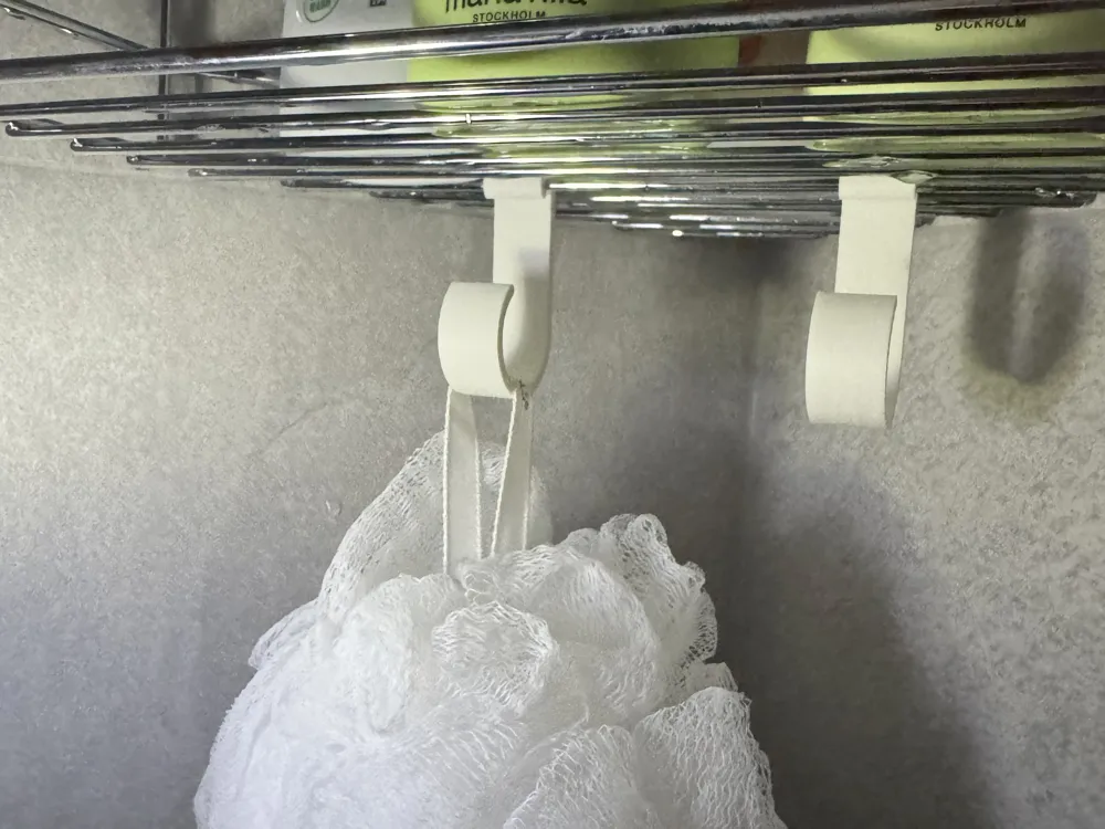 Shower shelf hook by Duckie MakerWorld: Download Free 3D Models