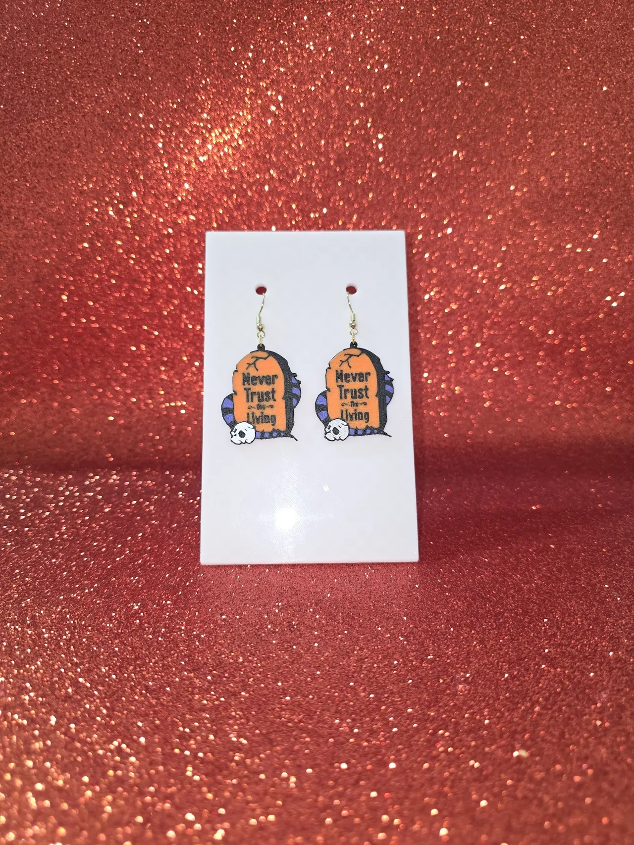 Demonic gravestone earrings view 2