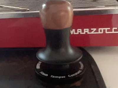 Coffee making tamping station