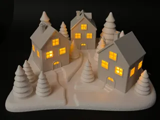 Teelichthäuser mit Winterlandschaft