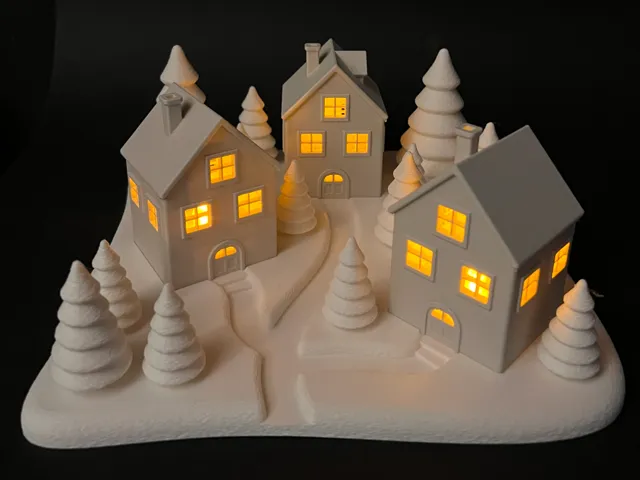 Teelichthäuser mit Winterlandschaft