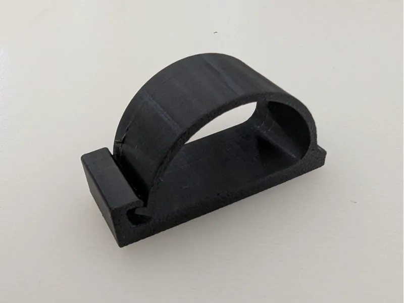 Cable holder for under the table