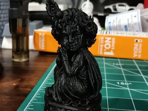 Krishna sitting