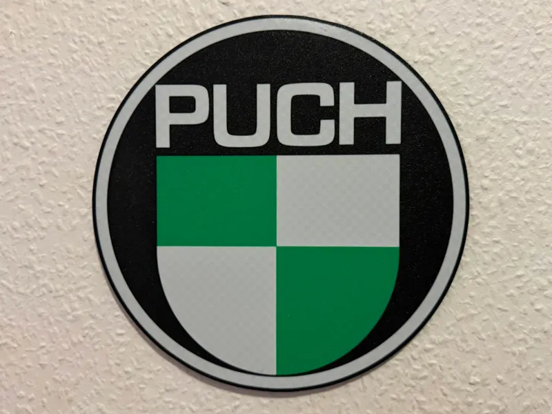 Puch wall sign