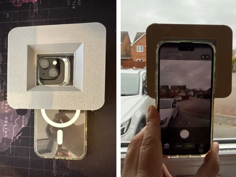 Phone camera lens shroud for filming through glass
