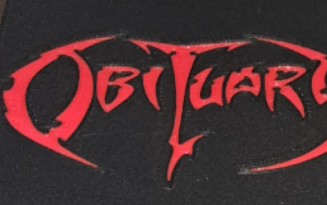 Coaster of the death metalband Obituary