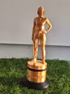 Female golfer figurine