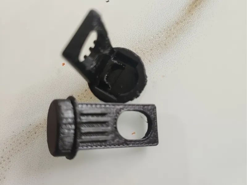 Latch button for the gas lift of Grohe toilet seat