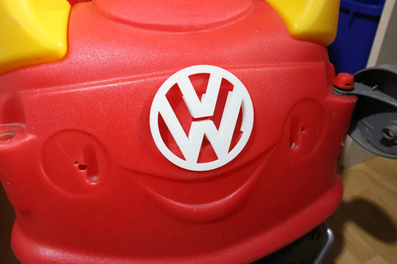 Cozy Coupe Volkswagen Emblem Front Licence Plate