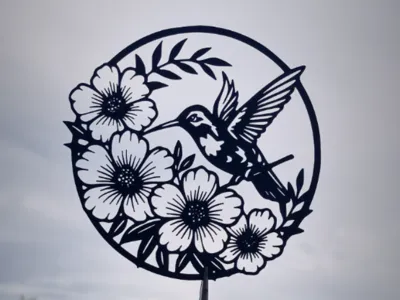 Hummingbird Among Flowers in a Circular Frame