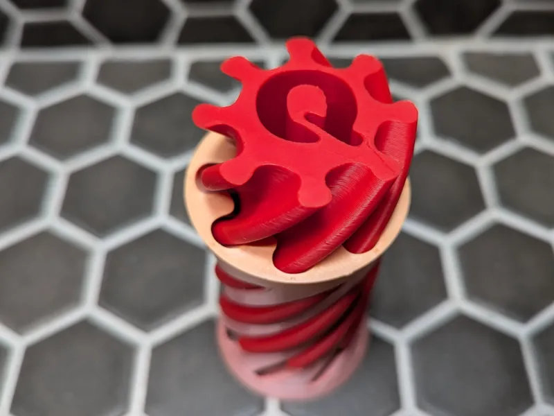 Spiral Vortex Fidget Letter Q Passthrough Toy 180d