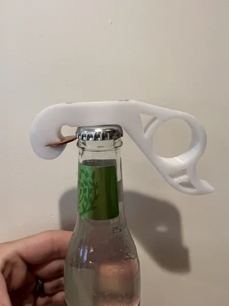The Penny Popper : décapsuleur magnétique une main pour frigo