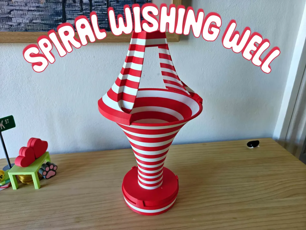 Caja o estuche: Festive Spiral Wishing Well - Coin Funnel Vortex. Referencia del modelo original.