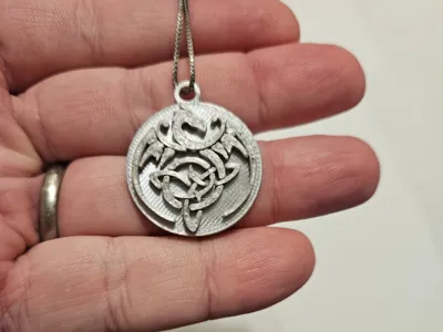 Celtic dragon symbol medallion