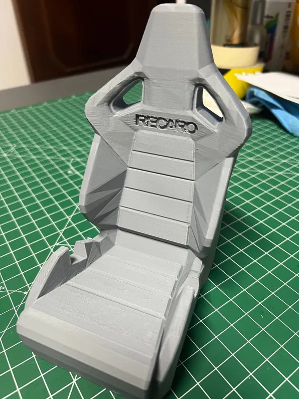 Support téléphone façon siège Recaro