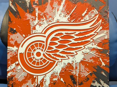 Red Wings splash Hueforge