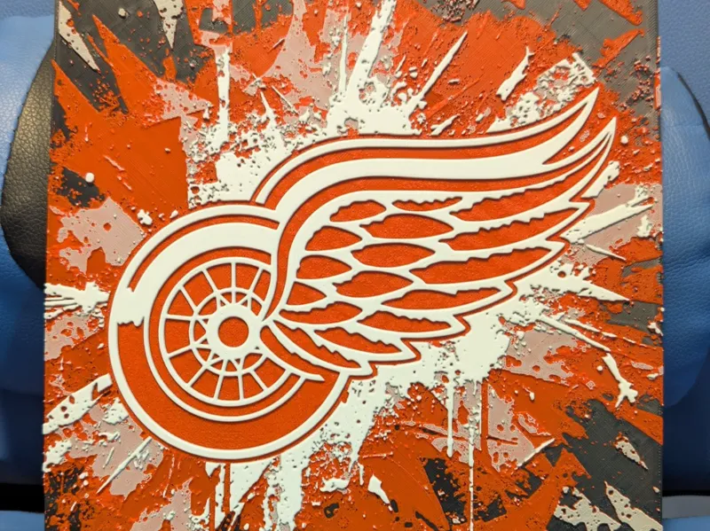 Red Wings splash Hueforge