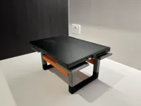 Support frame with heat dissipation holes.