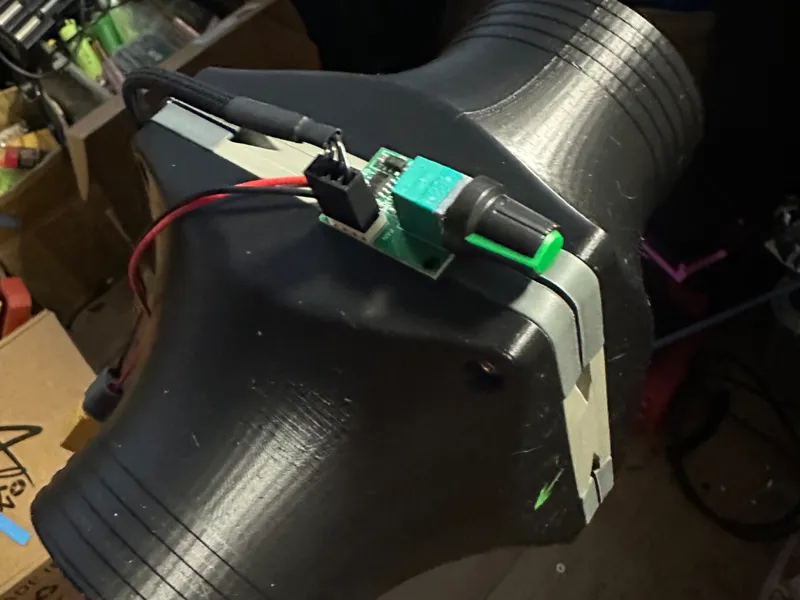 Inline duct fan with a 12cm DC fan.