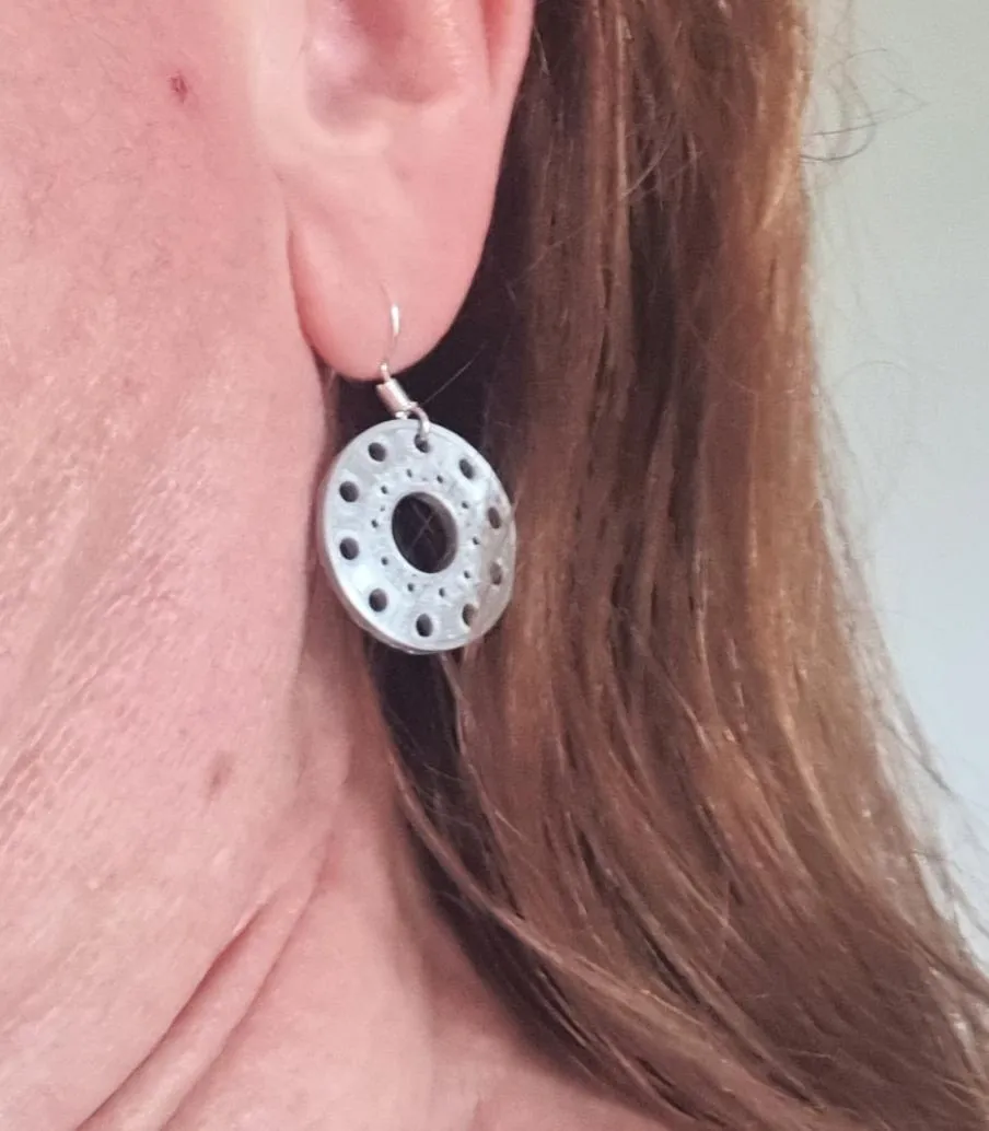 Semi truck Alcoa wheel earrings view 2