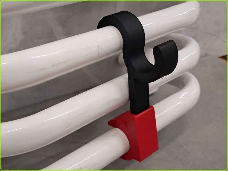Adjustable hanger for bathroom radiator.