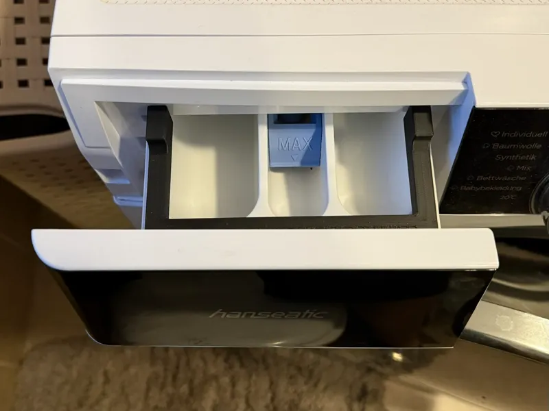 Washing machine drawer prop