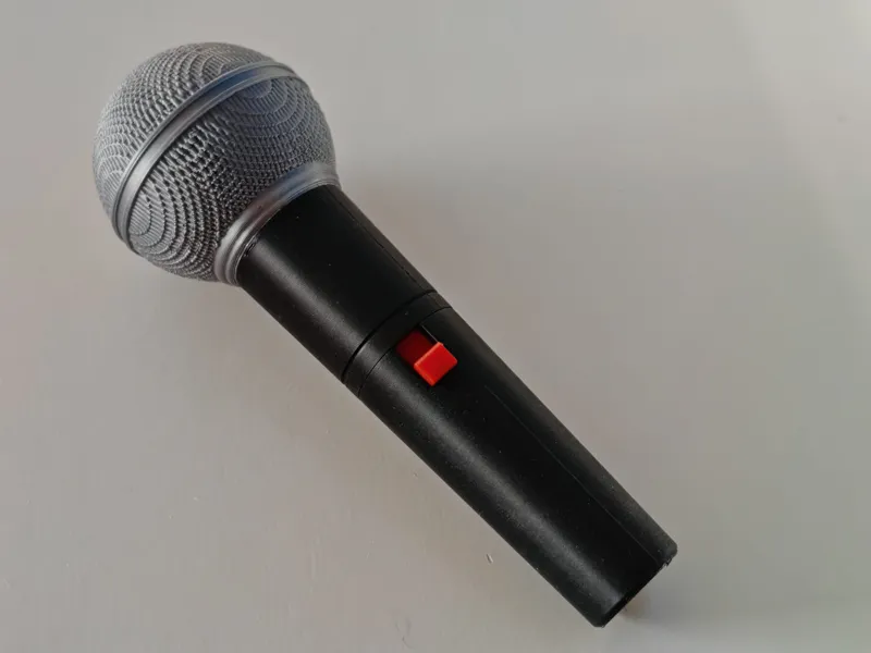 Toy microphone with fidget switch