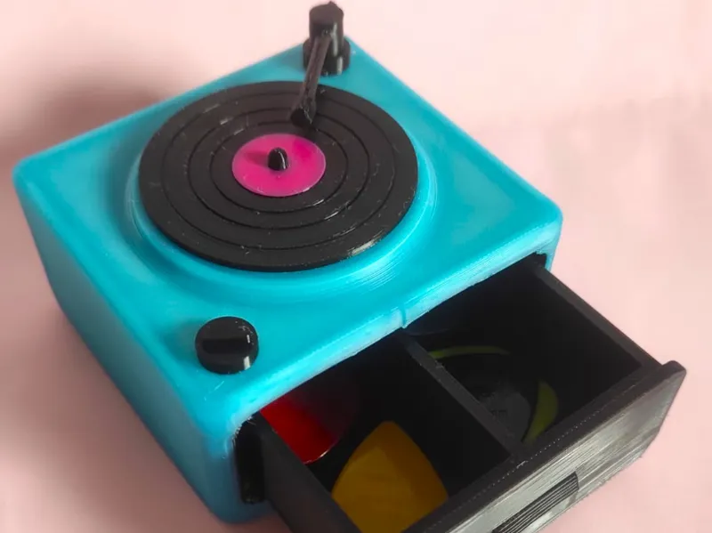 Tocadiscos guarda púas