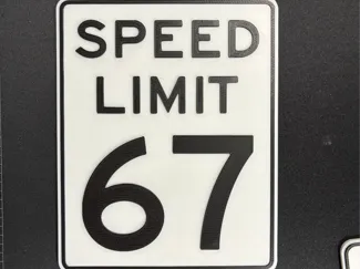 67 Speed Limit sign