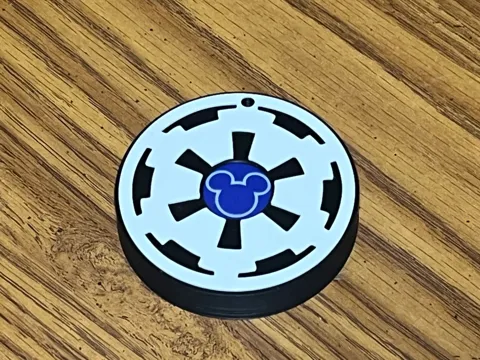 Letrero o emblema decorativo: Star Wars Imperial Logo - MagicBand+ Puck Holder — referencia de MakerWorld