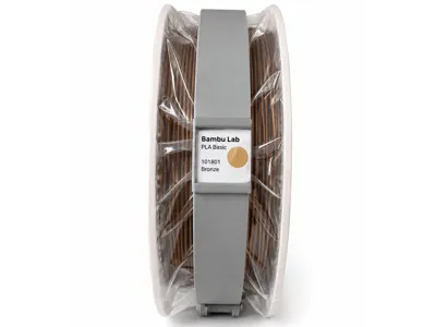 Spacer for spools in vacuum packaging