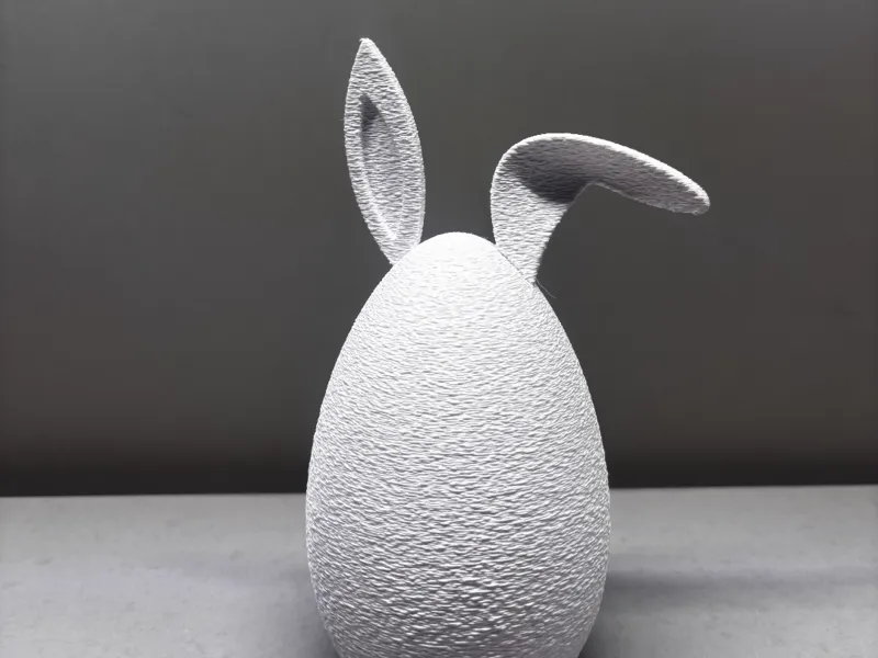 Osterei mit Hasenohren hängend