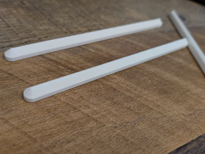 Build plate risers