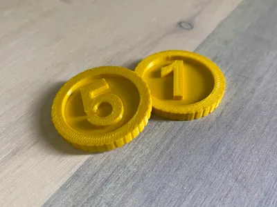 Toy Coins: One-Dollar, Two-Dollar, and Five-Dollar Pieces
