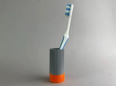 Minimalist geometric toothbrush holder