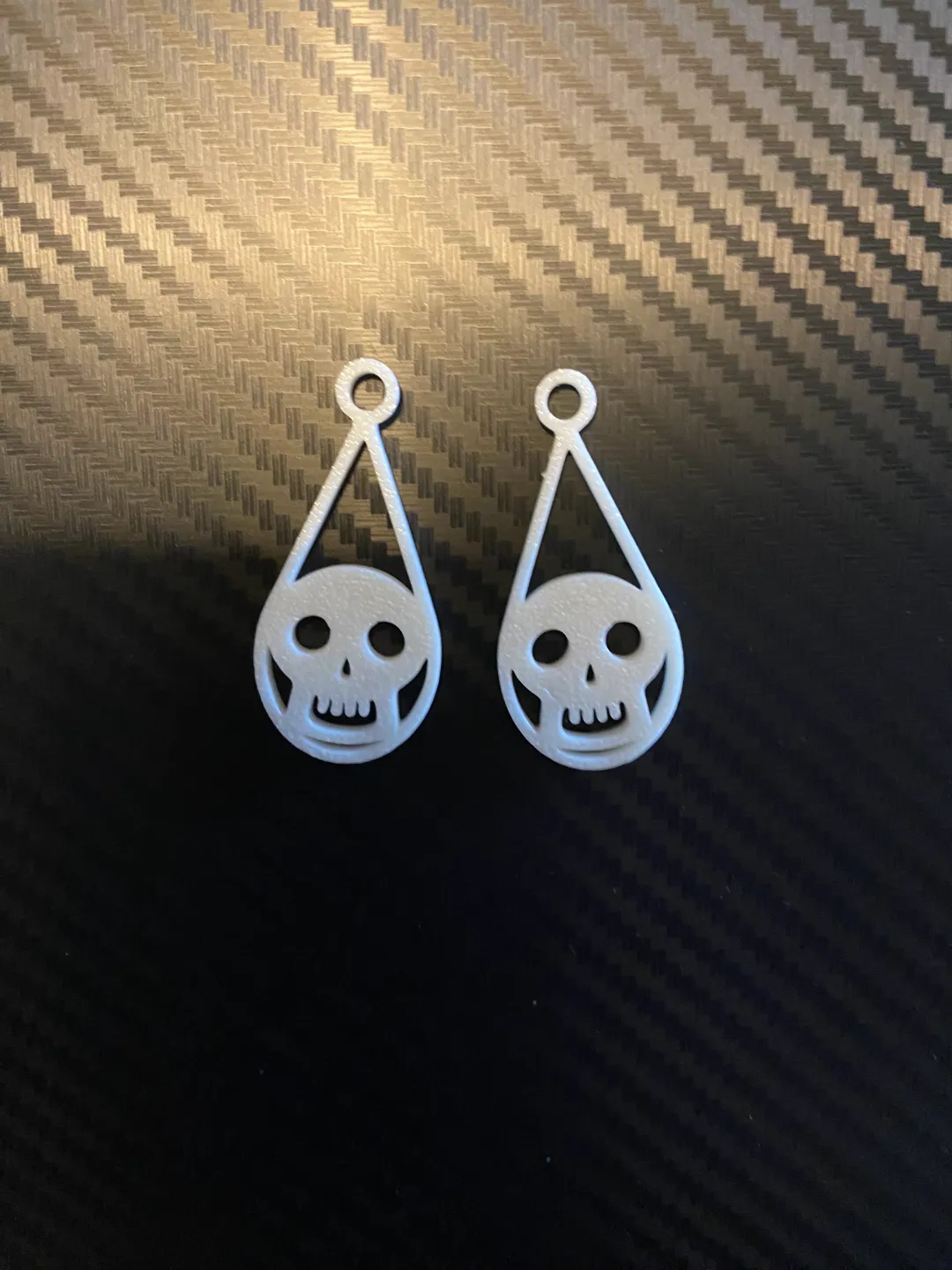 cute skull earrings view 2
