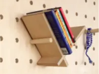 Angle bookshelf for pegboard - Basecamp