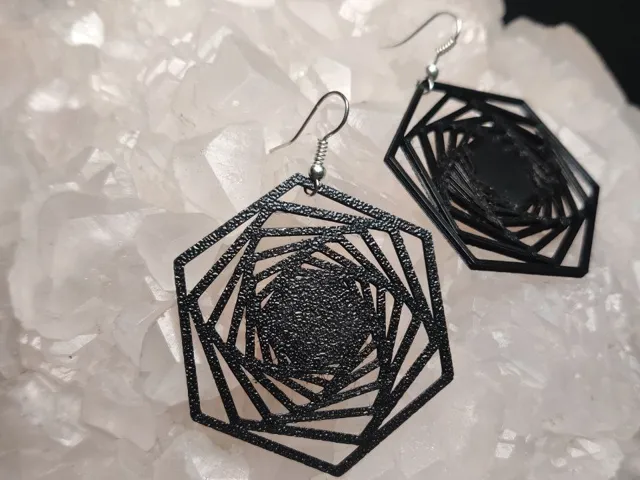 HEXAVORTEX – Earrings That Bend Reality