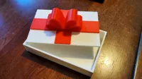 Boîte cadeau avec ruban (Noël/anniversaire) — photo 2
