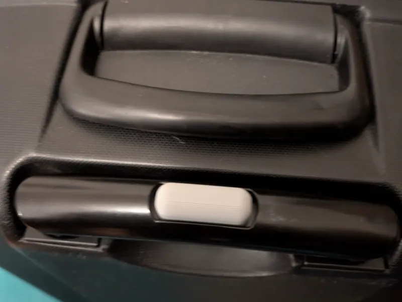 Suitcase button