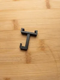 Hook for under cabinet rail system