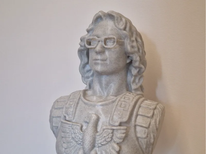 Bust of a man with glasses in a Roman breastplate