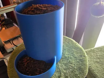 Gravity assisted cat feeder dog feeder