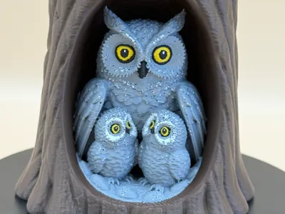 Owl Family in Trunk
