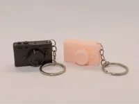 Chaveiro camera mirrorless