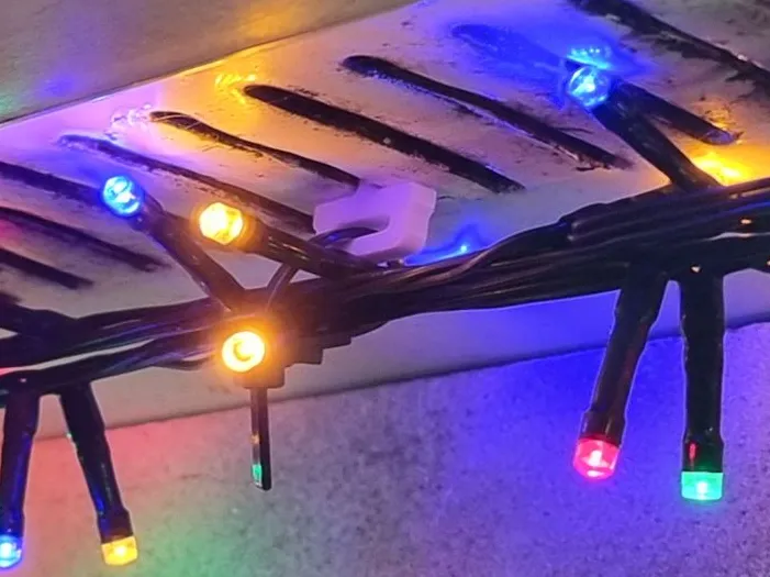 Christmas light clip for vented soffit